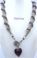 Collier de perles Delvina il est composé Longueur du collier y compris fermoir, 59 cm (23 po) Diamètre : 3,30 cm Ce collier de perles de verre est composé de  perles de rocailles en blanc transparent avec insertion de perles cubiques mauve Le fermoir couleur argent est très décoratif et aussi facile a manipuler pour les personnes qui ont des douleurs aux mains.Longueur du collier y compris fermoir, 59 cm (23 po) Diamètre : 3,30 cm Ce collier de perles de verre est composé de  perles de rocailles en blanc transparent avec insertion de perles cubiques mauve Le fermoir couleur argent est très décoratif et aussi facile a manipuler pour les personnes qui ont des douleurs aux mains.Longueur du collier y compris fermoir, 59 cm (23 po) Diamètre : 3,30 cm Ce collier de perles de verre est composé de  perles de rocailles en blanc transparent avec insertion de perles cubiques mauve Le fermoir couleur argent est très décoratif et aussi facile a manipuler pour les personnes qui ont des douleurs aux mains.